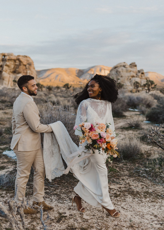 https://www.100layercake.com/wedding-fashion/the-bridal-cape-trend-is-back-in-this-70s-inspired-joshua-tree-elopement-editorial/